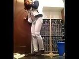 young girl pissing in jeans in bathroom
