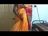 desi indian horny tamil telugu kannada malayalam hindi cheating wife vanitha wearing orange colour saree showing big boobs and shaved pussy press hard boobs press nip rubbing pussy masturbation